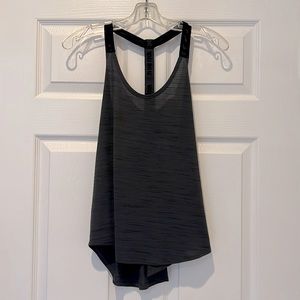 Grey and black Nike dri-fit razorback workout tank.